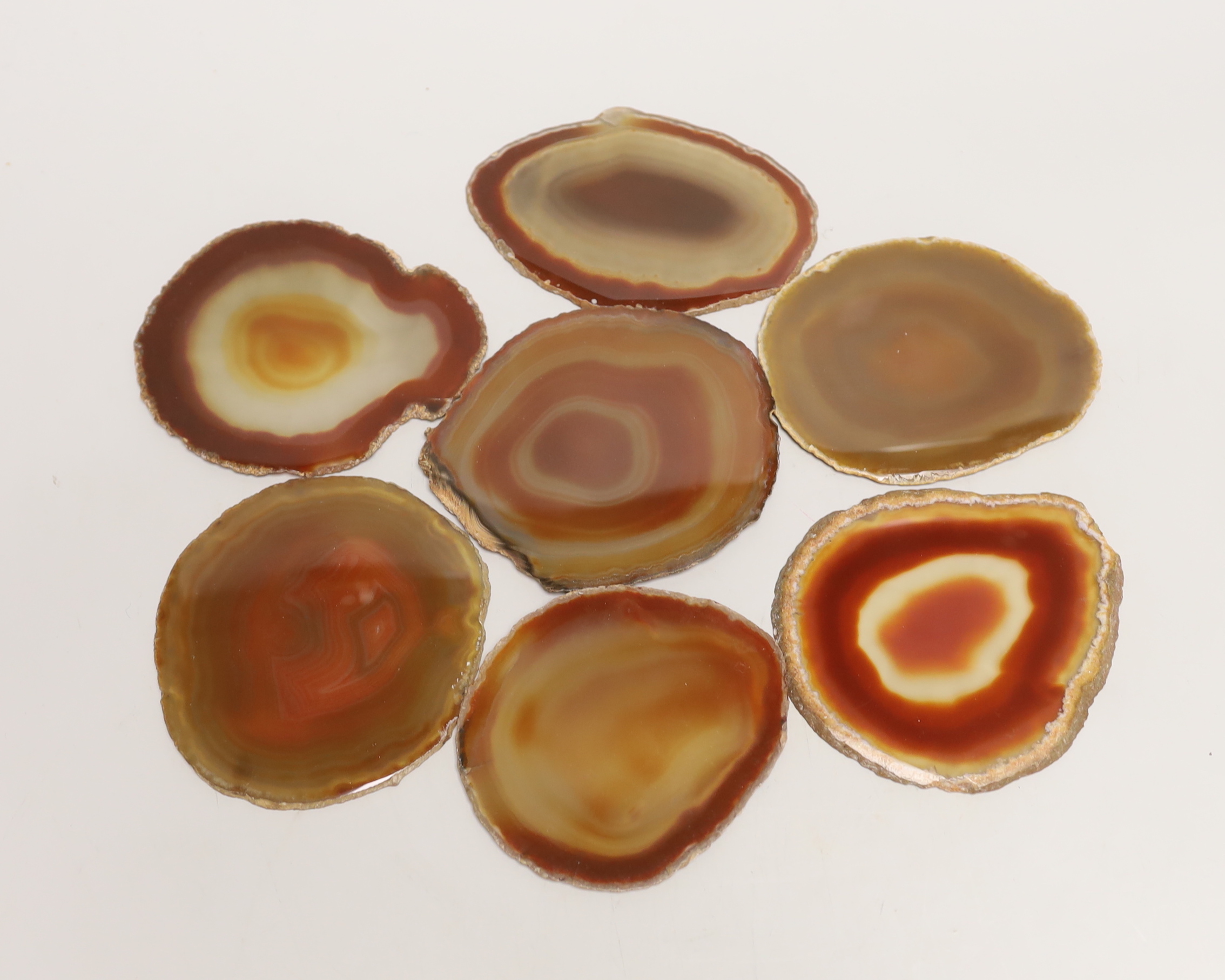 Seven assorted agates.